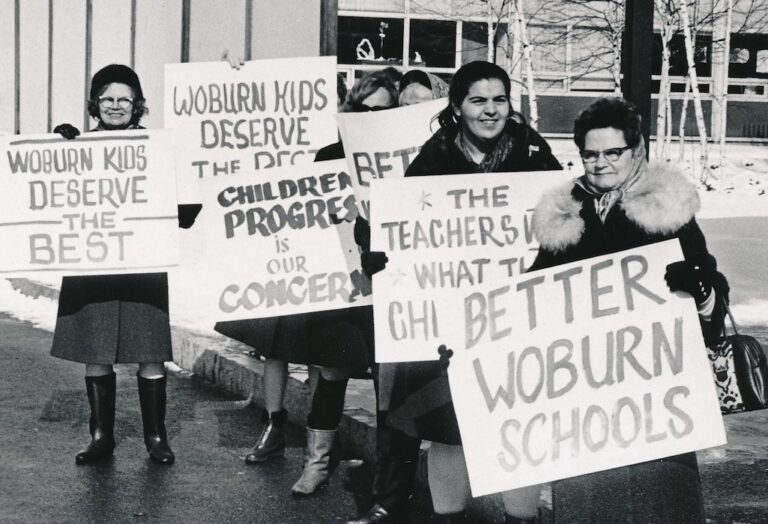 Group of picketers holding signs supporting the Wakefield strike.