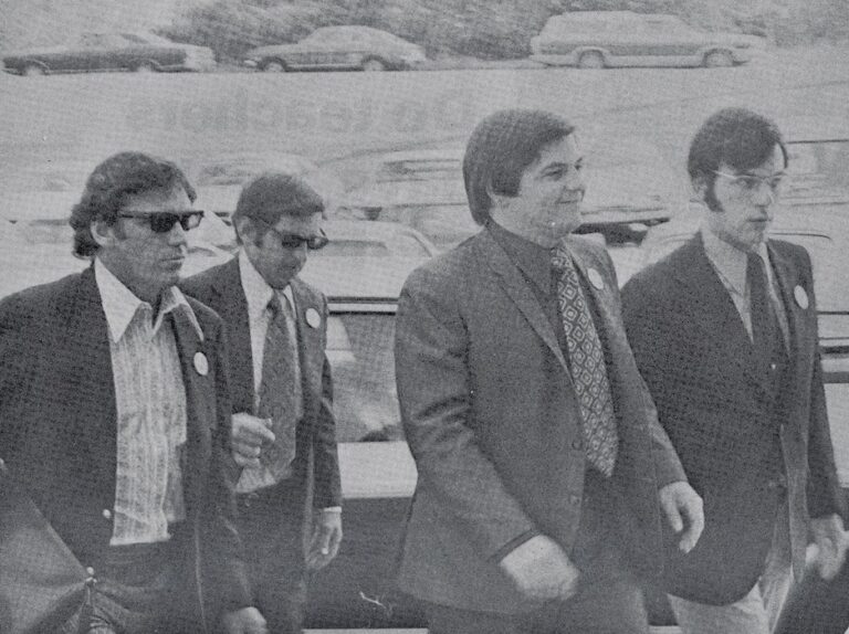 James Long, Chester McLaughlin, Jay Rutkowski, and Louis Intoppa walking outside.