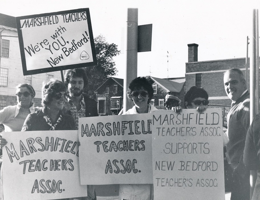 Group of Marshfield teachers holding signs supporting the New Bedford strike.