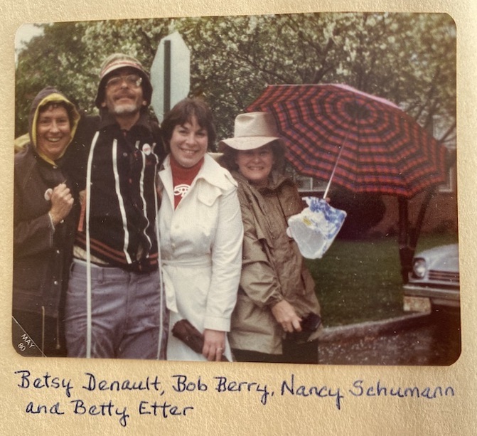 Group of people in the rain.