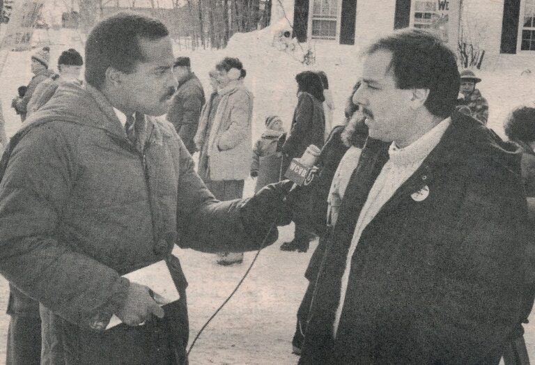 Reporter interviewing Stuart Berkowitz.