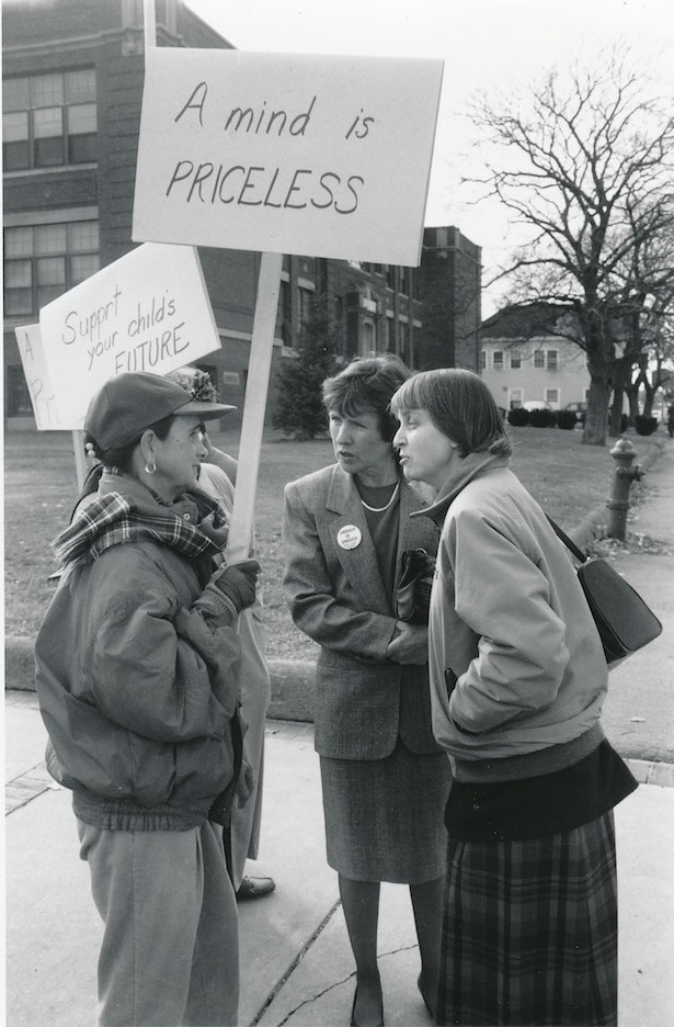 Group of picketers with signs supporting the Beverly strike.