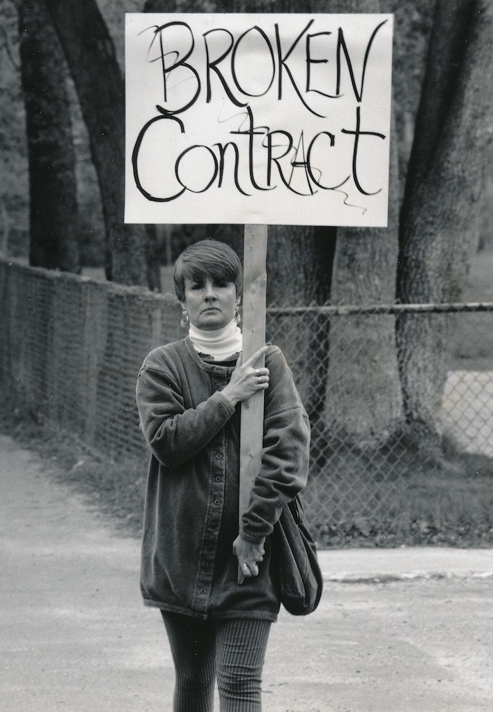 Picketer holding sign supporting the Wakefield strike.