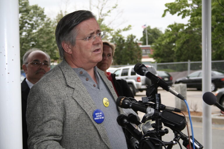 Paul Phillips in front of numerous microphones.