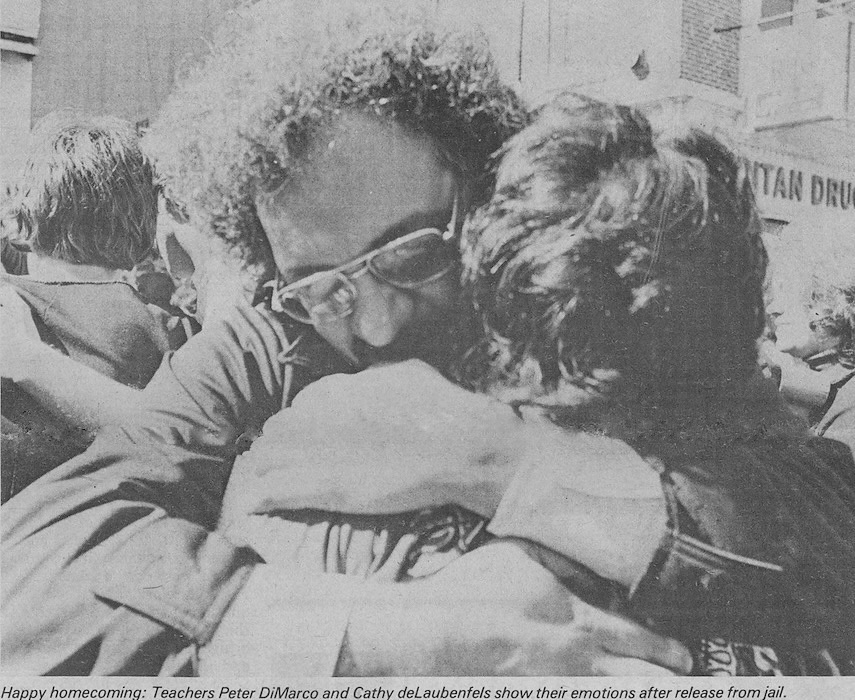 Peter DiMarco and Cathy deLaubenfels hugging.