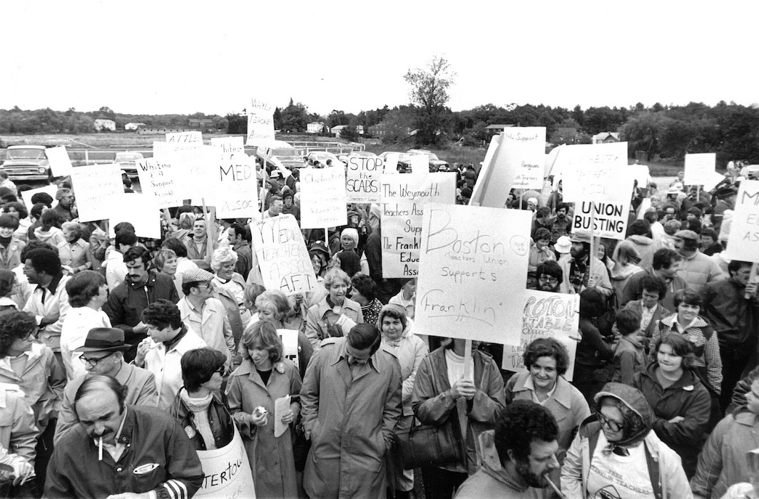 Crowd of people with signs supporting the Franklin strike.