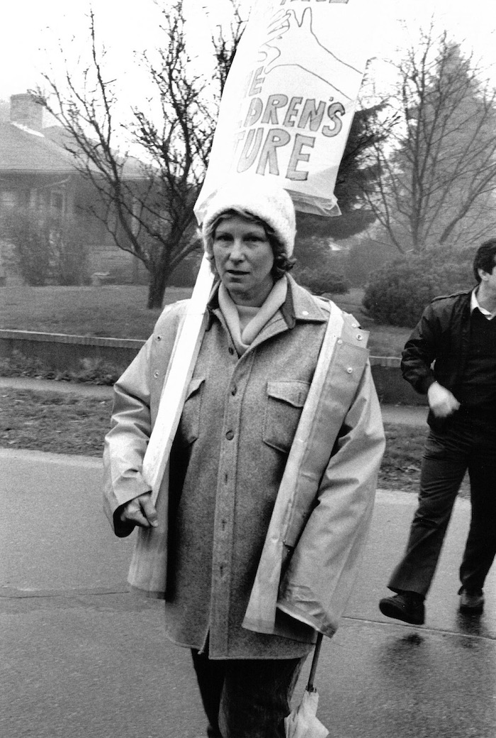 Picketer with a sign supporting the Lexington strike.
