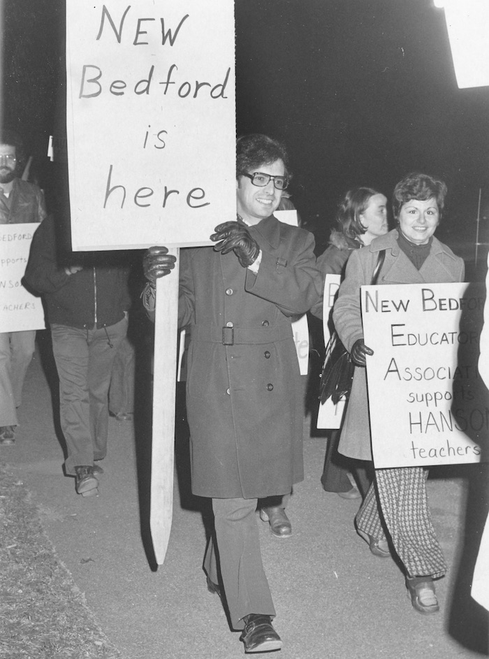 Picket line, with picketers holding signs supporting the New Bedford strike.