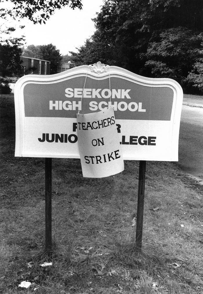 Sign supporting the Seekonk strike hung on the Seekonk High School sign.