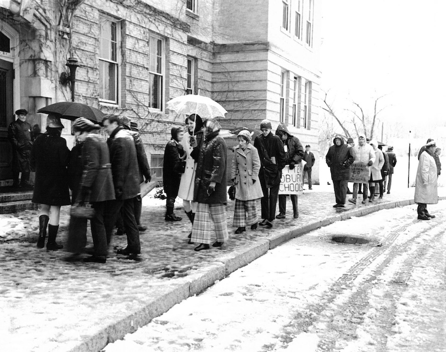 Crowded picket line in the snow.