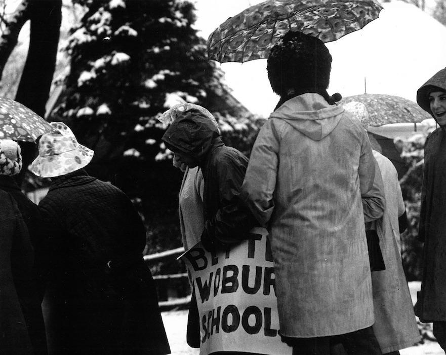 Crowded picket line in the snow.