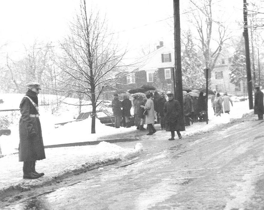 Crowded picket line in the snow.