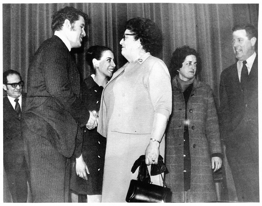 Two people shaking hands.