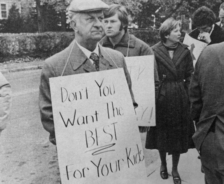 Picketer with sign.